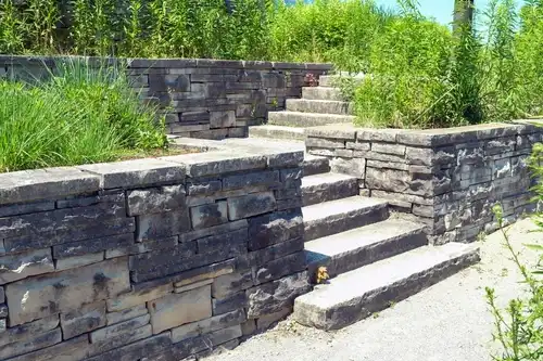 Custom stone retaining wall with steps